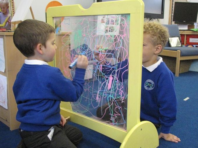 Pupils practising letter formation skills