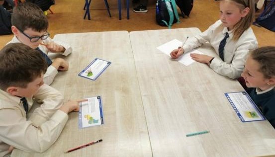 children sat at a table 