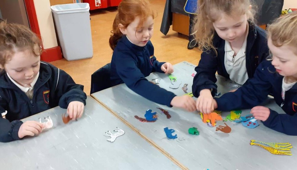 Children working at a desk together