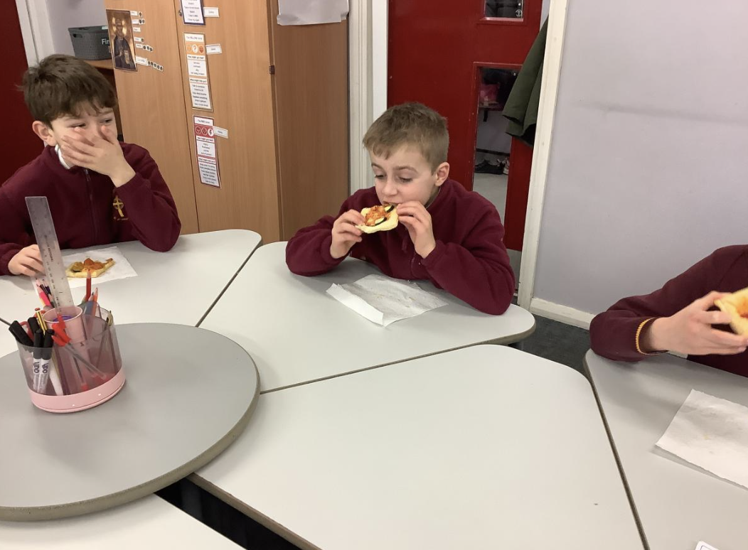 Pupil with the vegetable tart they designed in DT and baked.