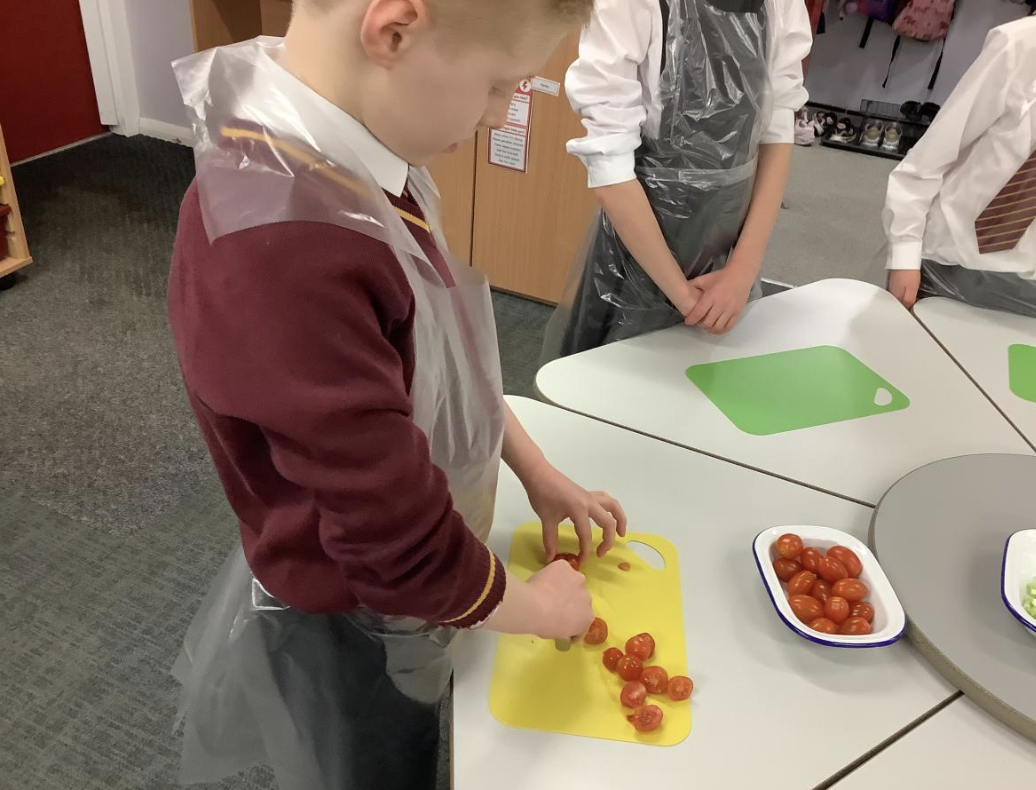 Pupils preparing vegetable tarts