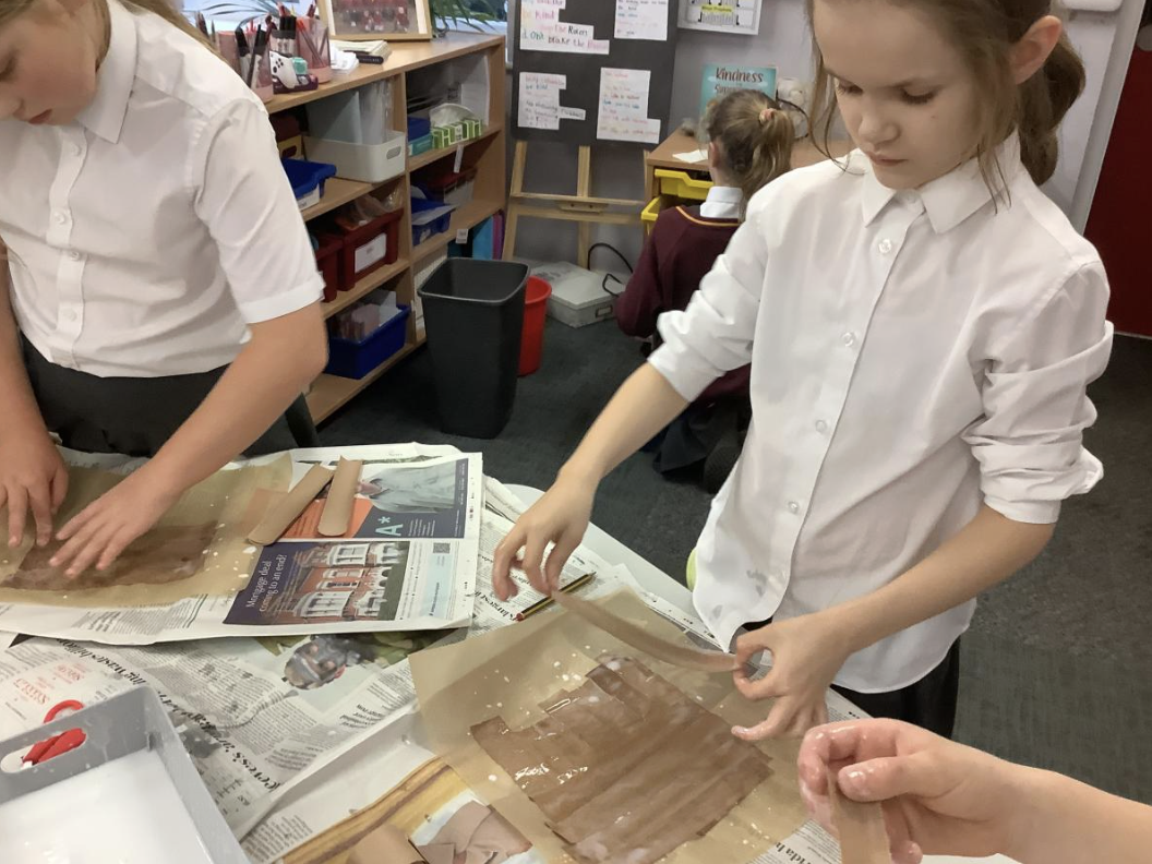 Pupils making papyrus style paper