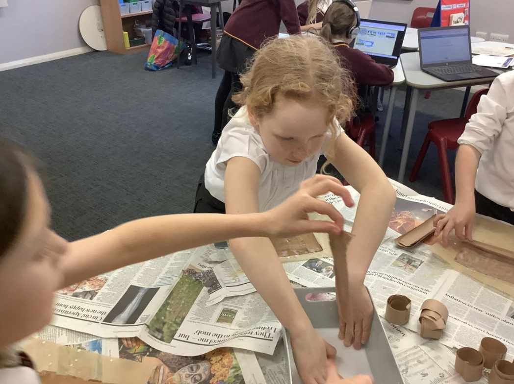 Pupils making papyrus style paper