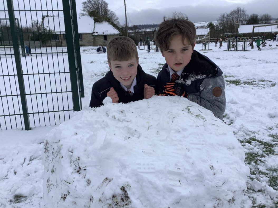 Enjoying our first day back to school in the snow.