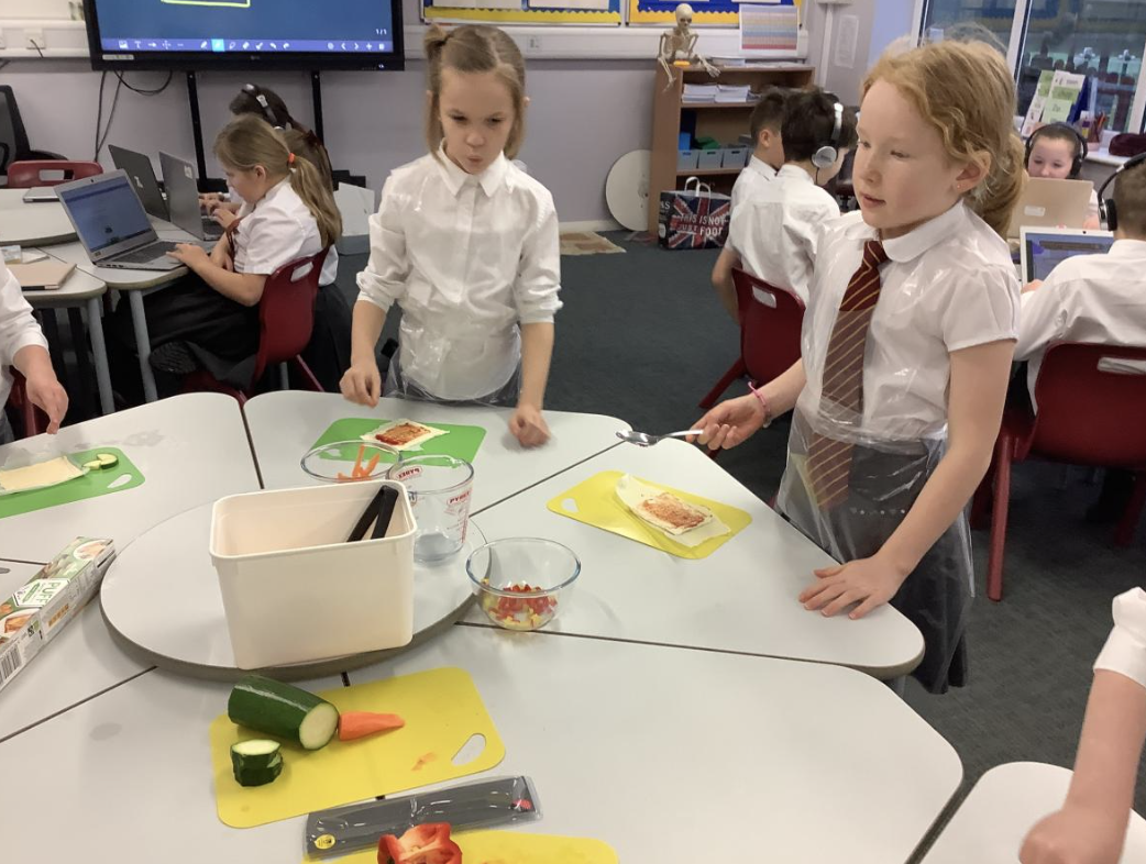Pupils preparing vegetable tarts
