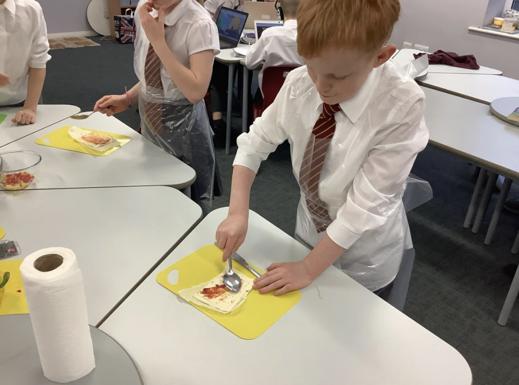 Pupils preparing vegetable tarts