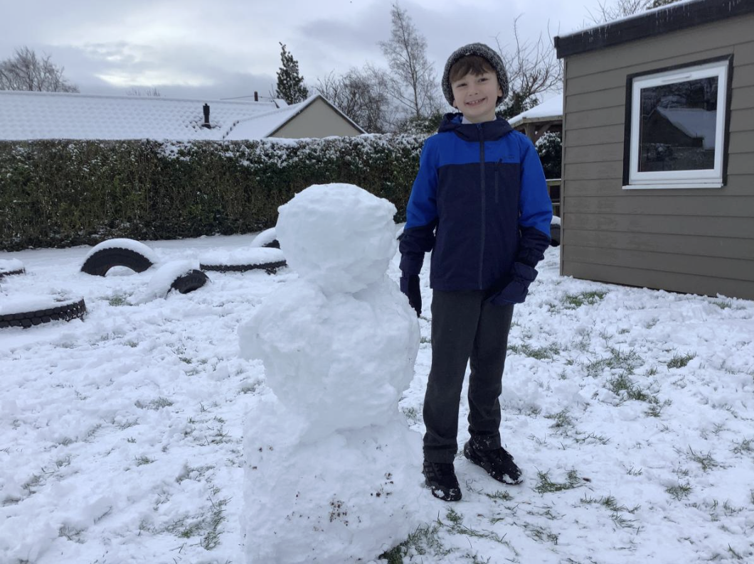 Enjoying our first day back to school in the snow.