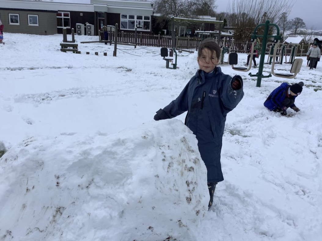 Enjoying our first day back to school in the snow.