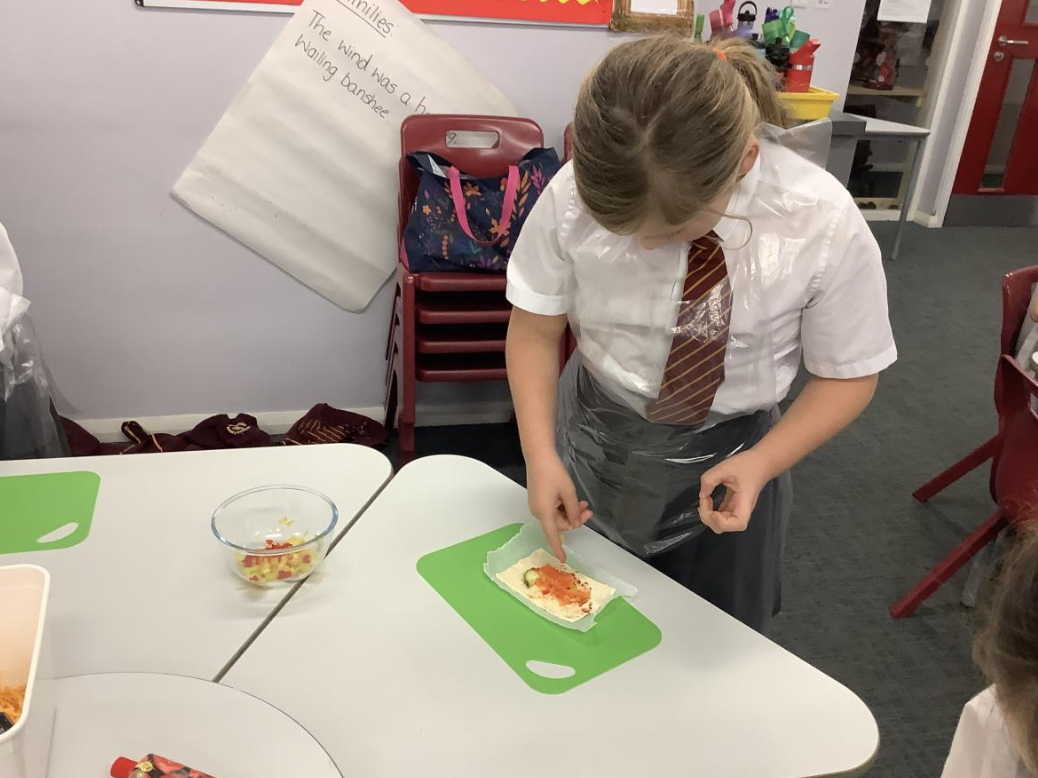 Pupils preparing vegetable tarts