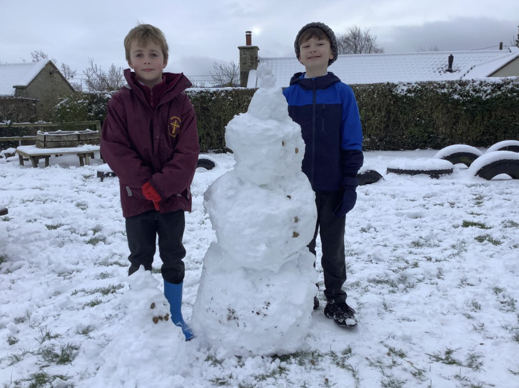 Enjoying our first day back to school in the snow.