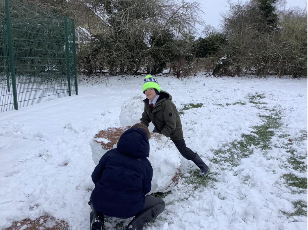 Enjoying our first day back to school in the snow.