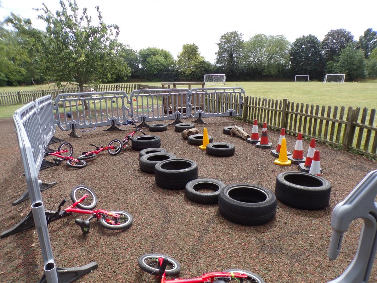 The track is most often used for balance bikes but we also use it for space hoppers. The the track is changed using chalk, tyres and cones. 
