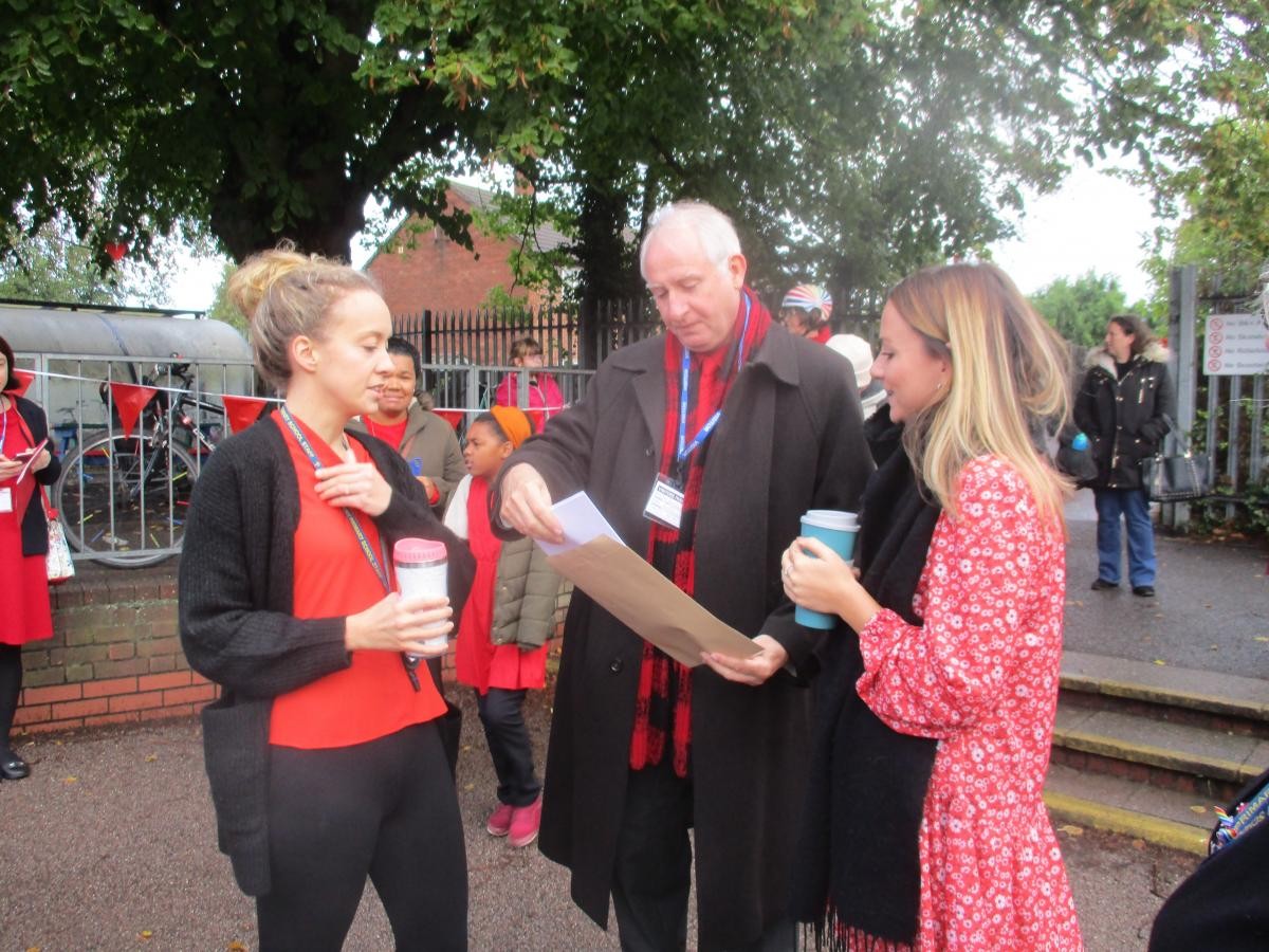 Teachers present MP with letters written by Y5 pupils about climate change. 