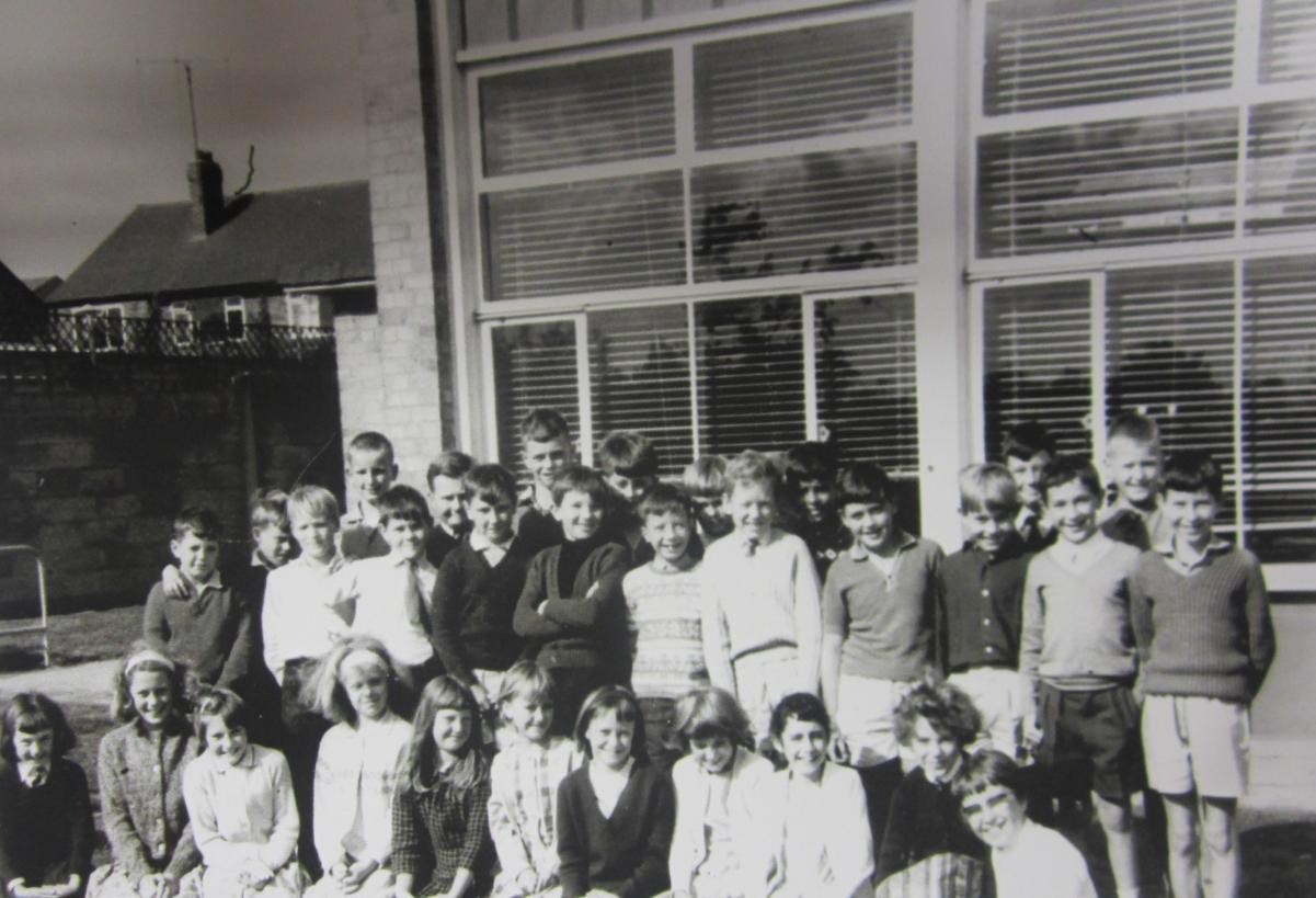 Pictures from old photo albums found in school. Do you recognise which classroom this is? Are there any clues?