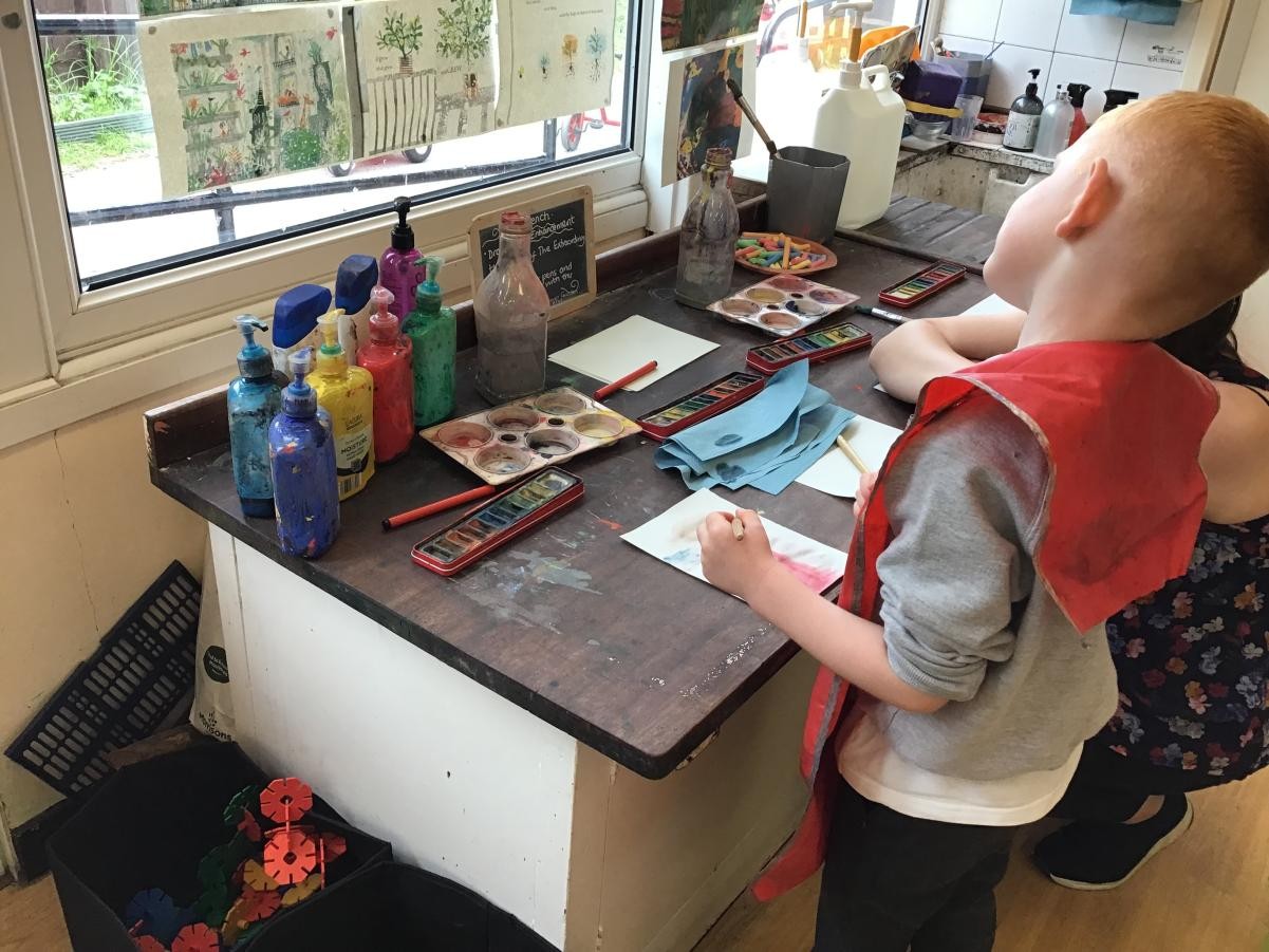 In early years the children enjoy creating their own pieces of art.
