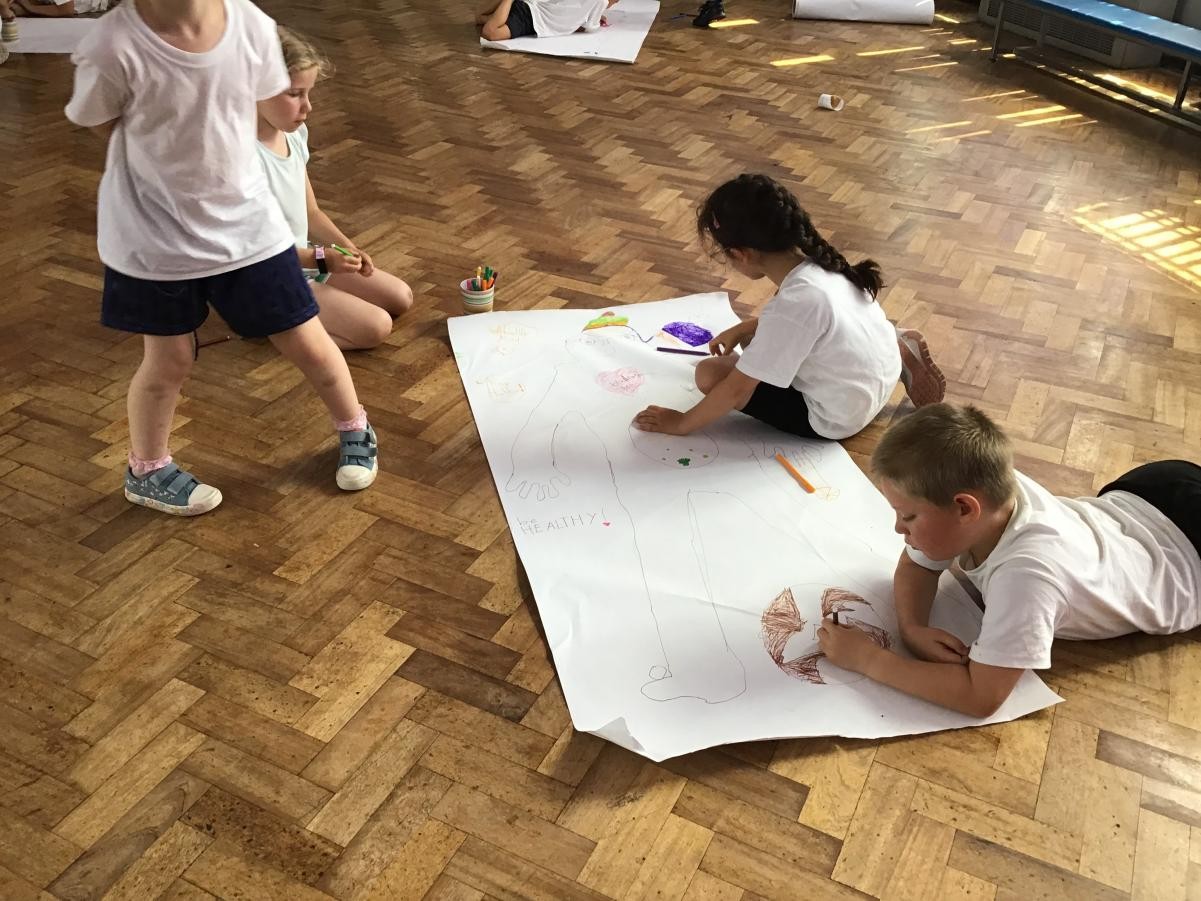 The posters were displayed in the hall for everyone to see.