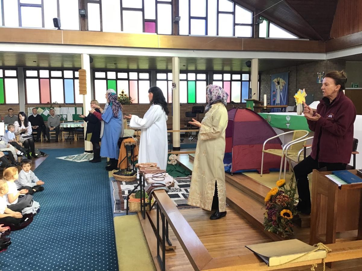 Christians worship in a church. We like visiting our local church which is called St Michael and All Angels.