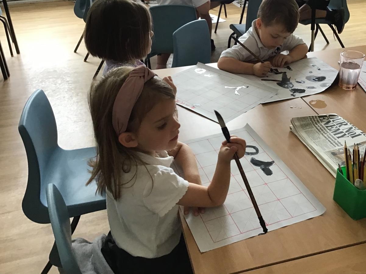 We found out all about calligraphy and we had a practise with the ink and brushes.