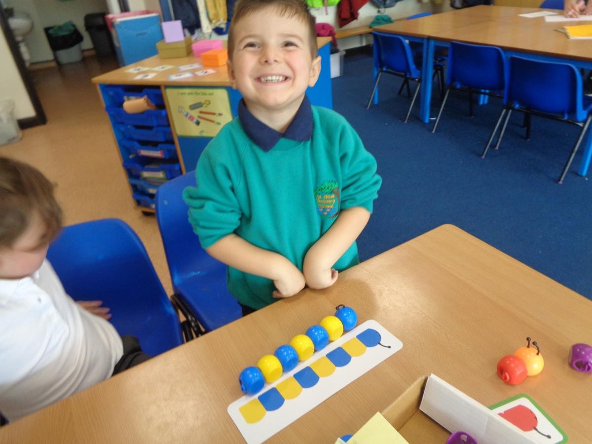Brodie copied a pattern using blue and yellow.