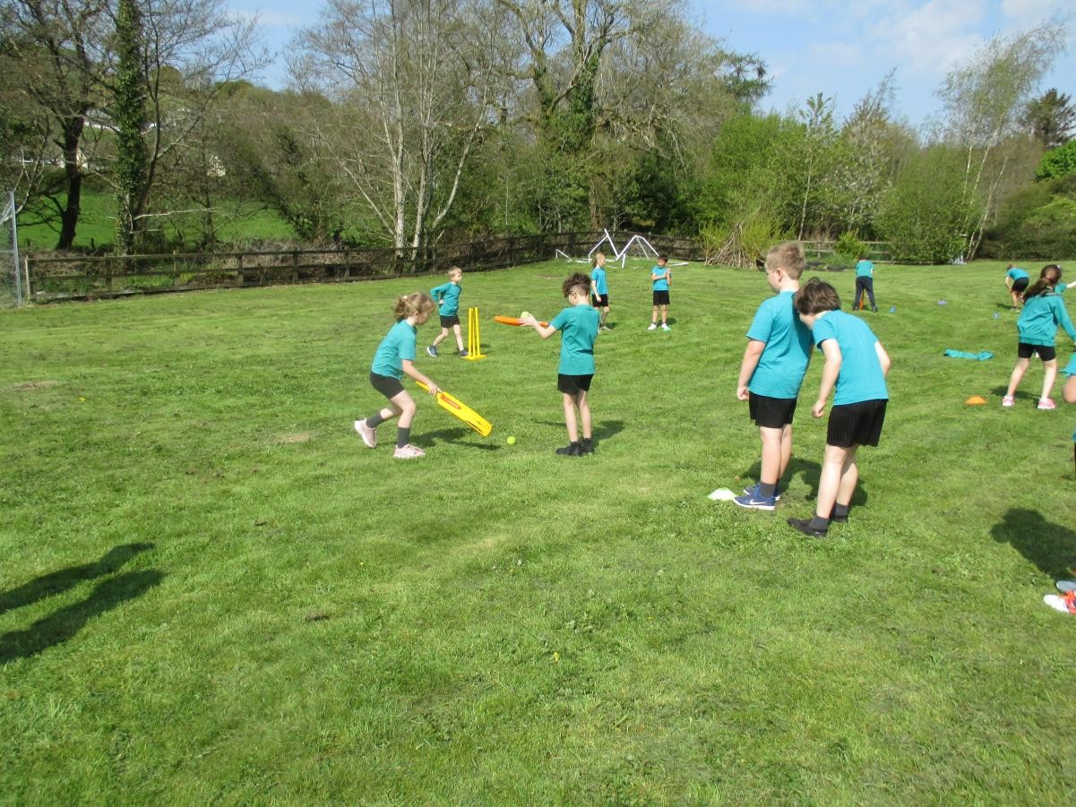 The children learned skills including bowling, batting and fielding. 