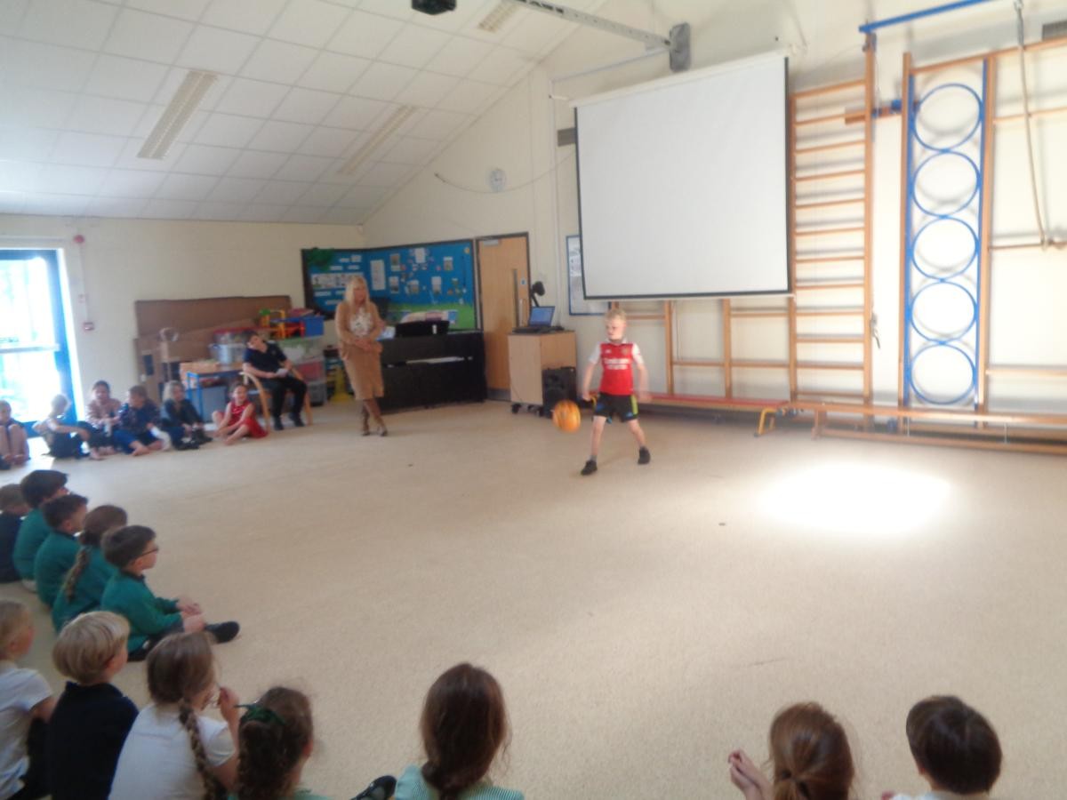 Bernie entertained with some football kick ups