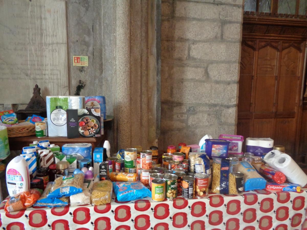 We collect food for the local foodbank at our Harvest Festival