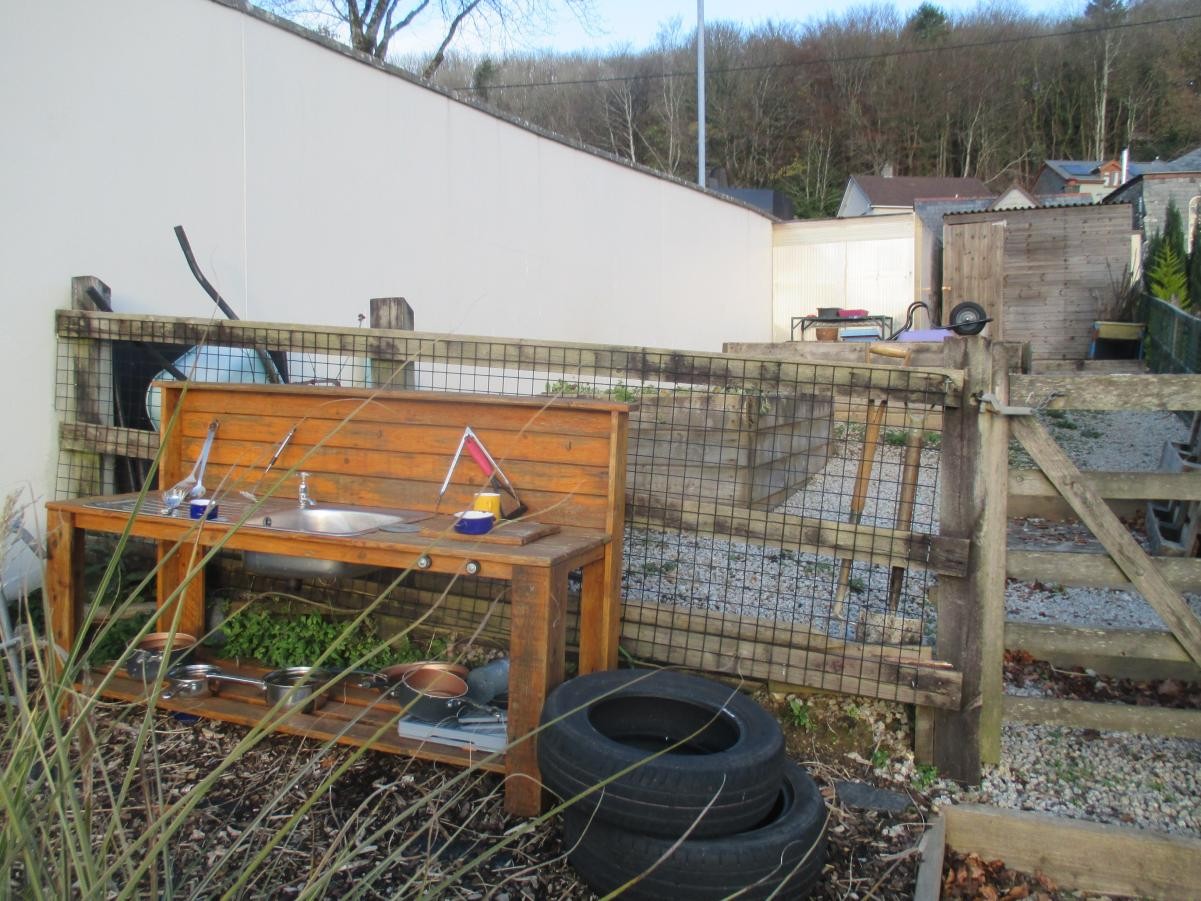 We have a wonderful mud kitchen and sensory garden area.