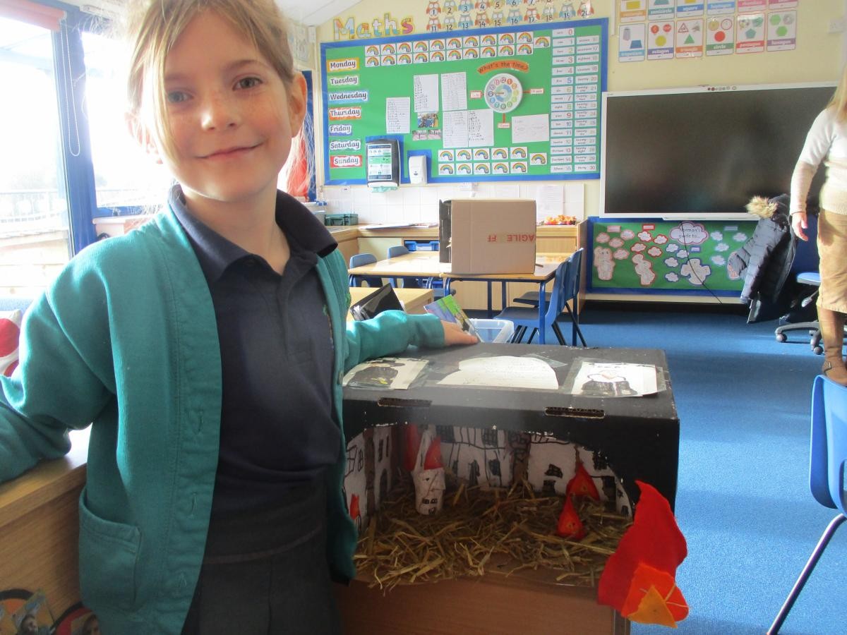 Leah-Rose added information to her diorama.