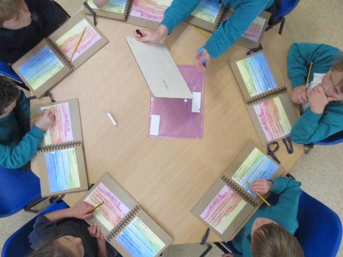 The older children supported the younger children with their writing.