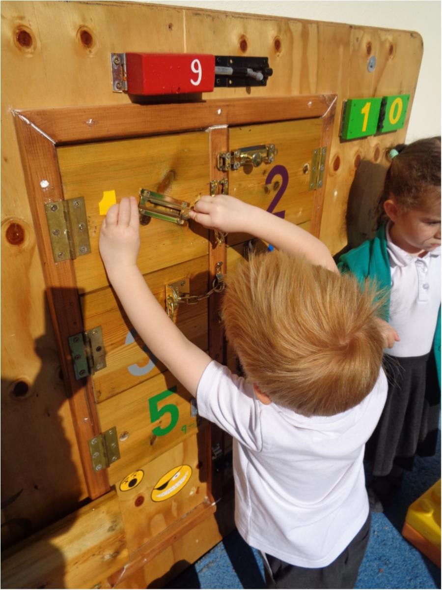 We have been learning how to open all sorts of different fastenings on our board. There are bolts, chains and even combination locks. 