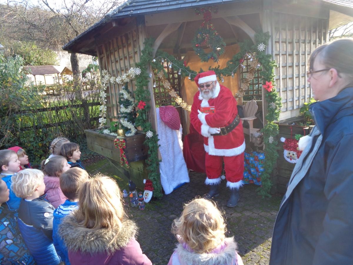 Father Christmas comes to visit the village