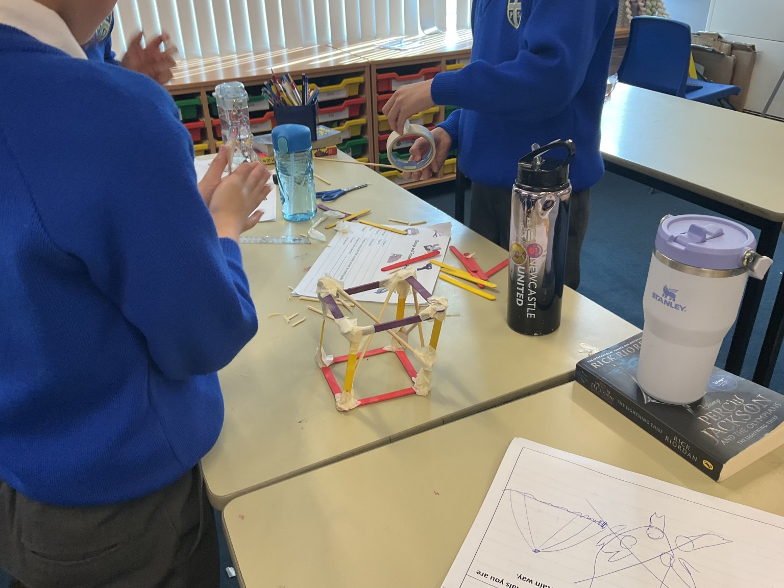 We began to make our structures out of tape and wood