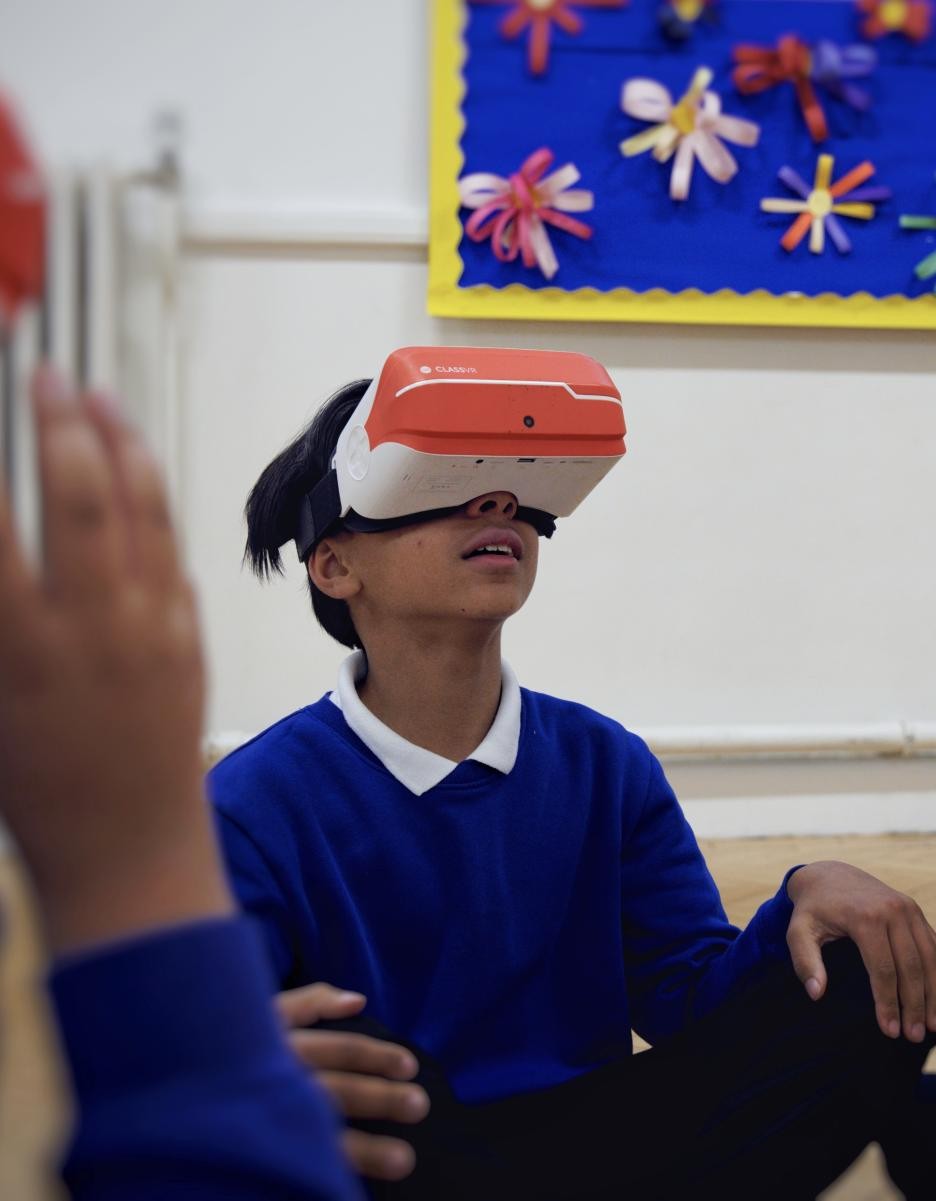 Pupil wearing a virtual reality headset