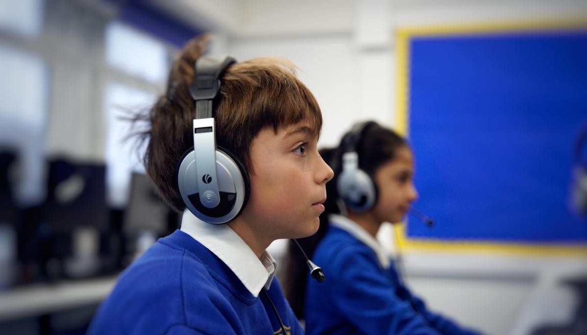 Children wearing headphones