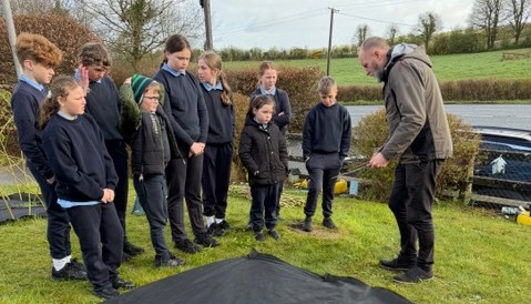 As part of Creative Schools the children on the Creative Schools committee worked with weaver Stephen Mc Quaid to build living willow huts on the front garden. 
