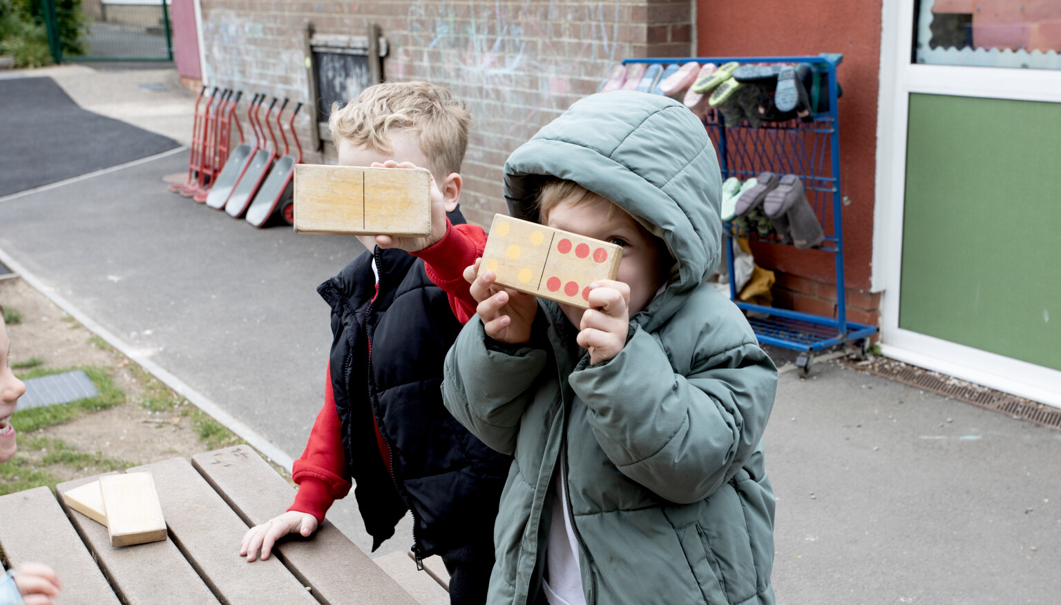 Reception pupils in EYFS garden