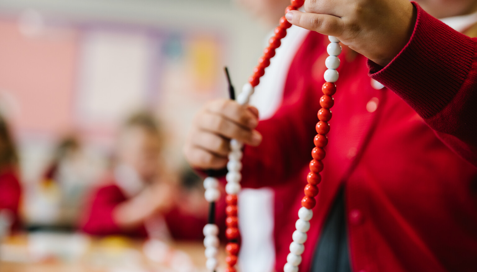 Maths - bead strings to calculate
