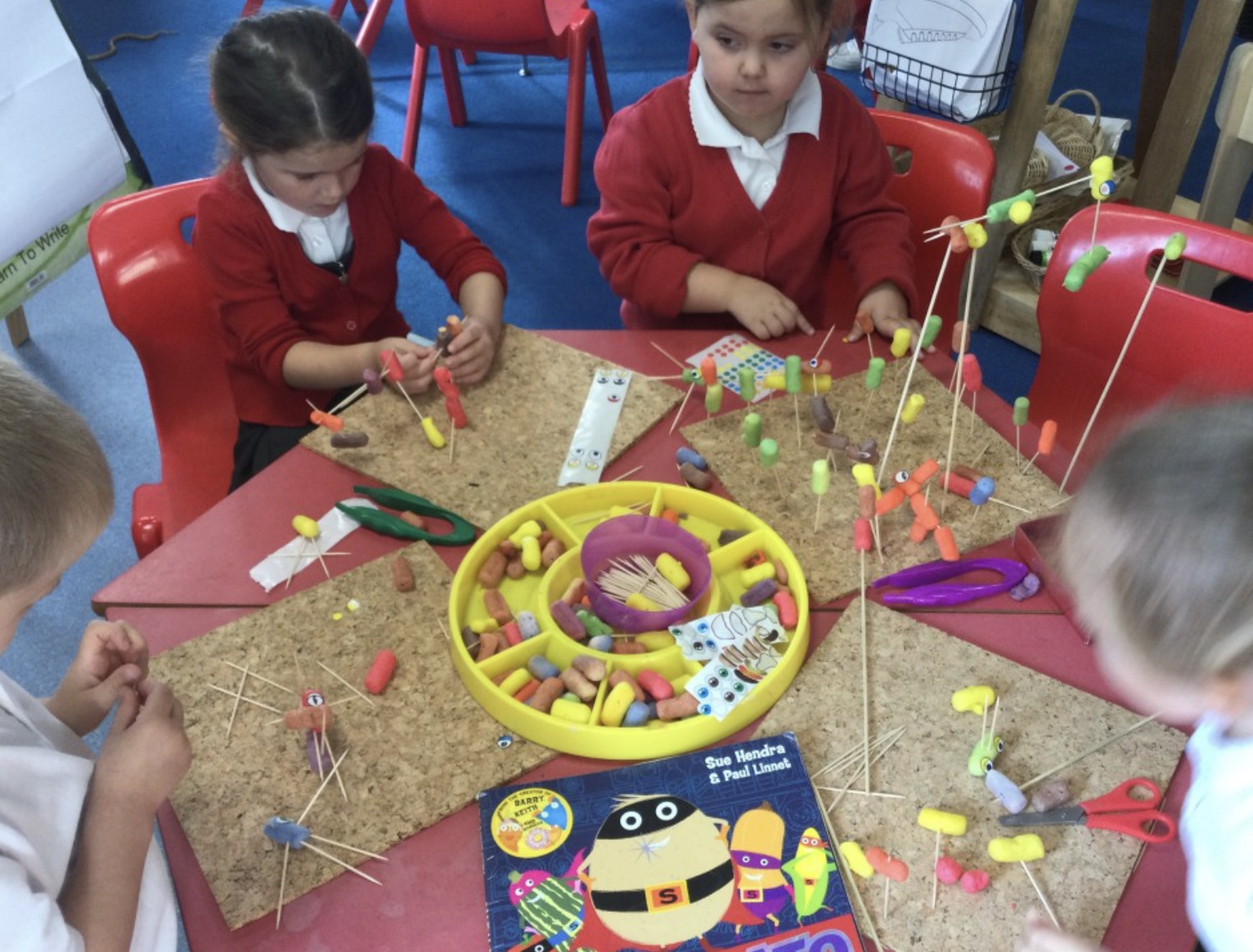 Pupils using Maths manipulatives