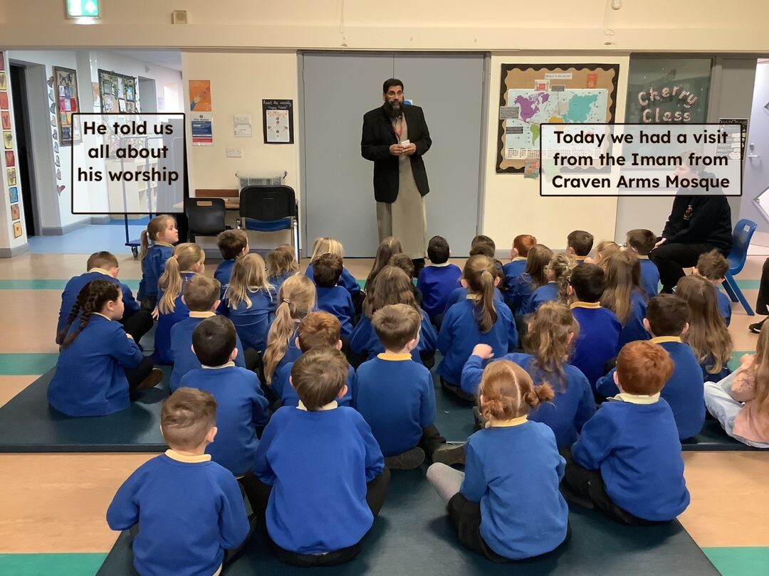 Pupils listening the Imam