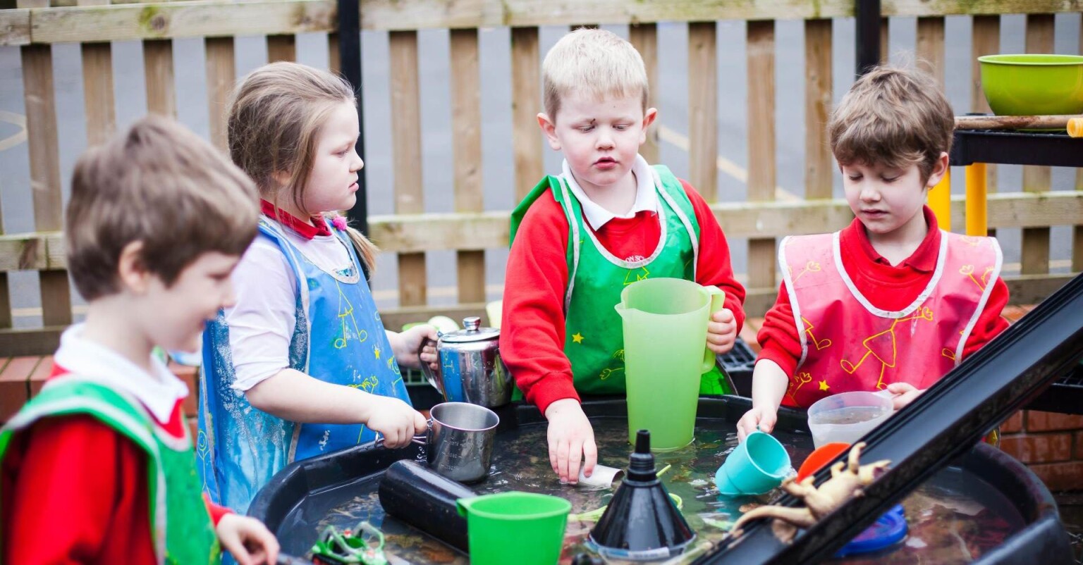 Pupils with outdoor water play