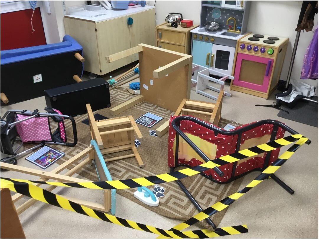 Classroom crime scene with yellow tape across items