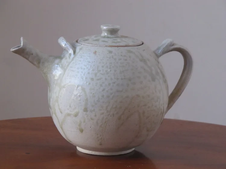 Teapot with wood ash glaze. 23cm W x 16cm H. Sonia Lewis. £80