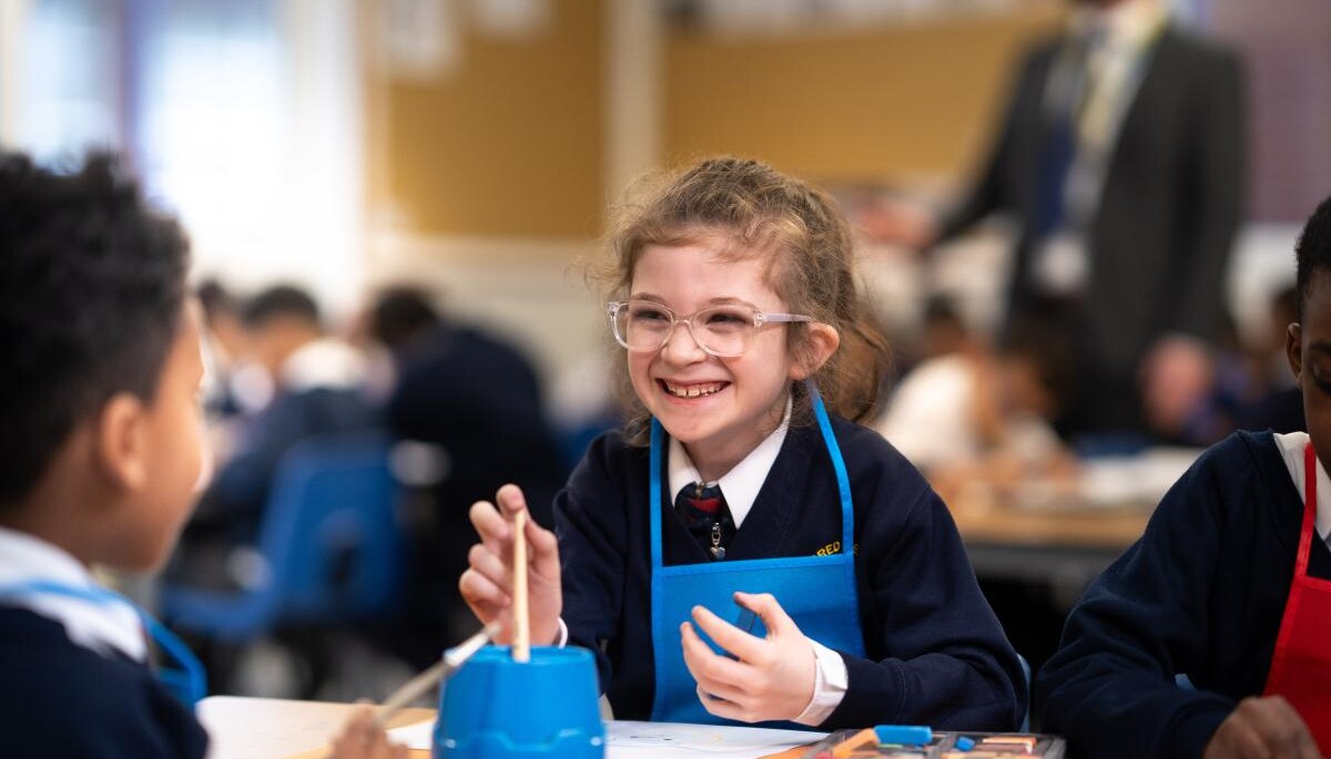 Smiling pupils in class