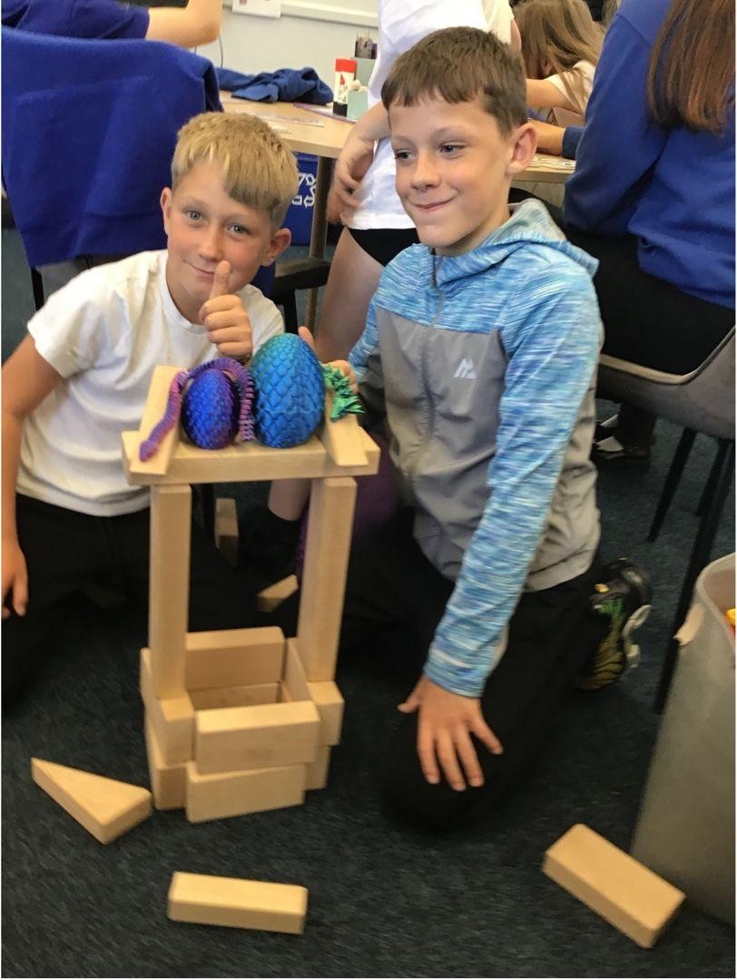 Smiling pupils working together