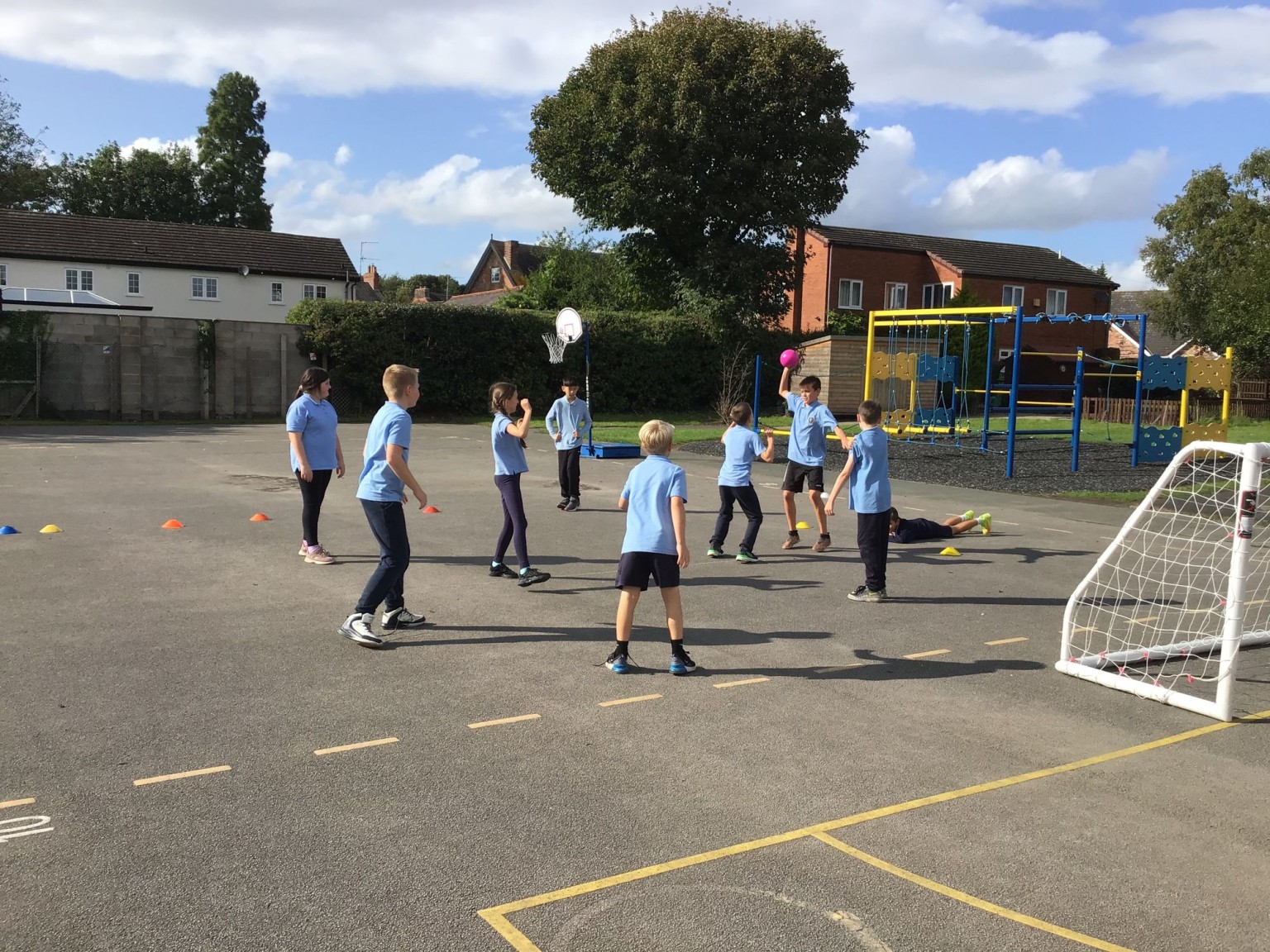 Children throwing a ball