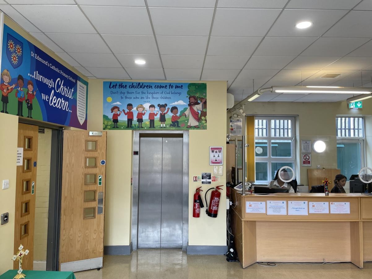 “A school prayer and our mission statement are displayed at the entrance, reminding all of our daily faith in action.