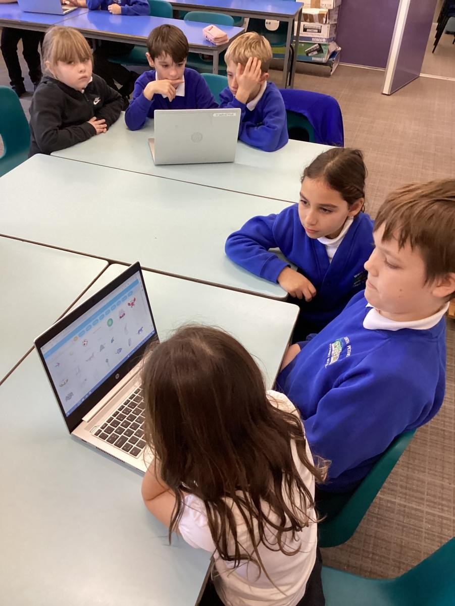 The children enjoyed programming their Scratch characters in groups.