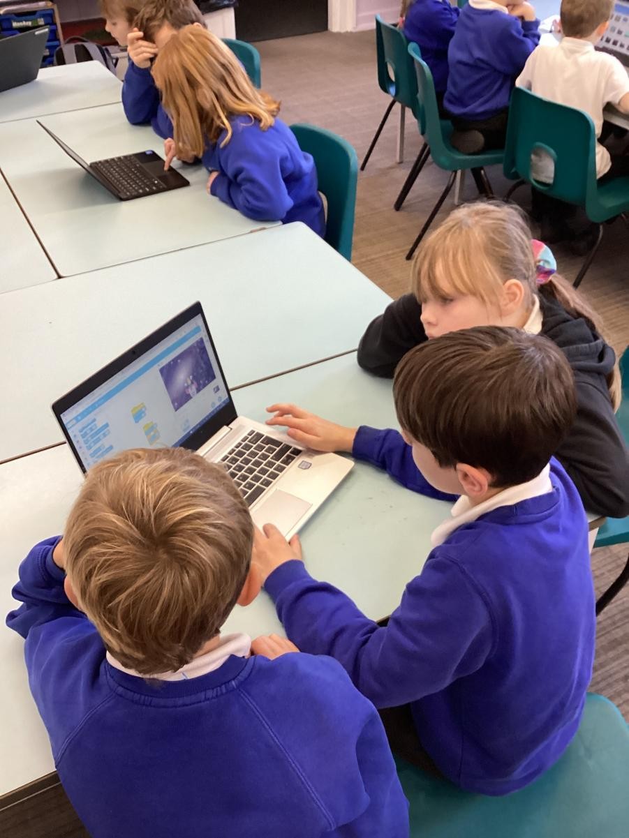 The children enjoyed programming their Scratch characters in groups.