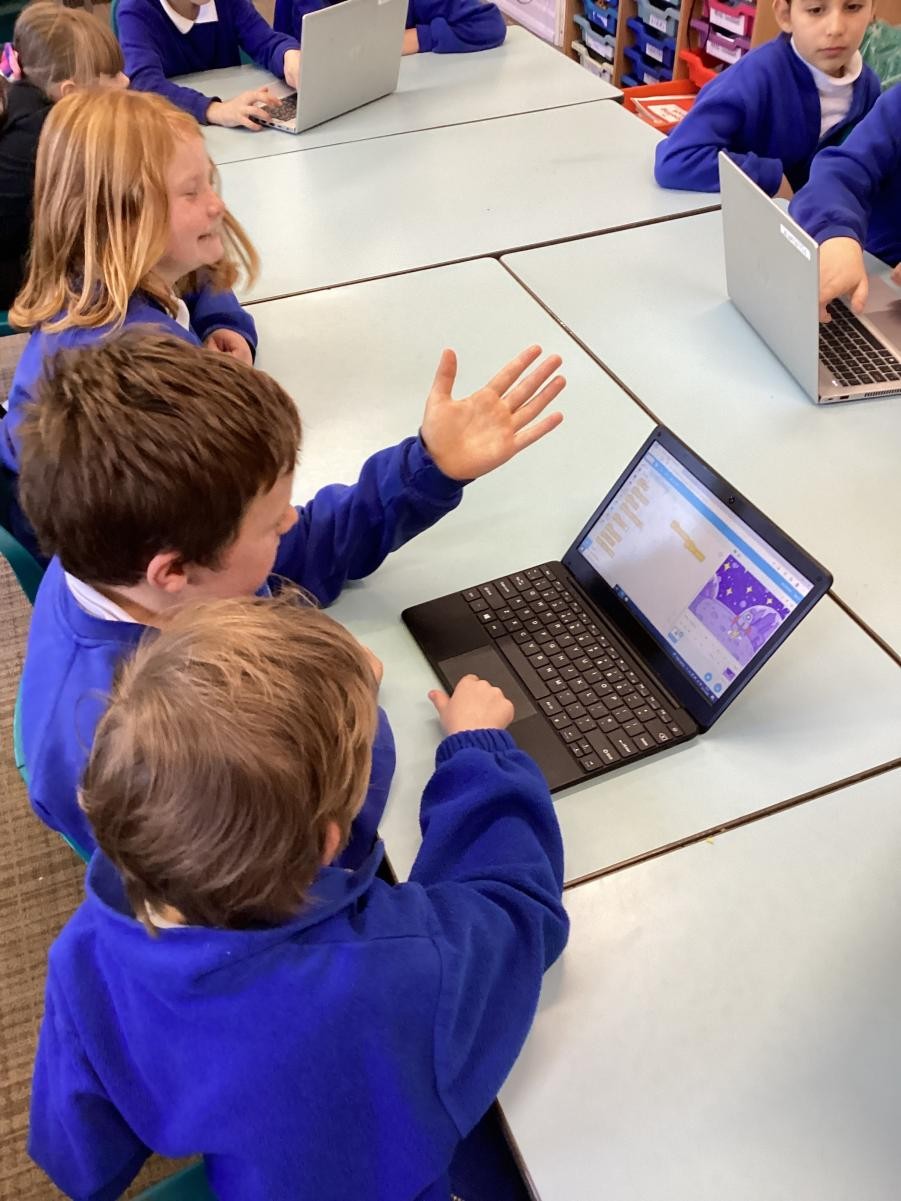 The children enjoyed programming their Scratch characters in groups.