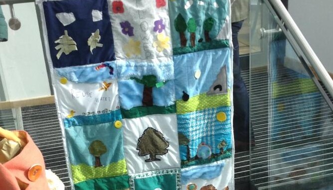 School quilt with squares stitched and felted in DT